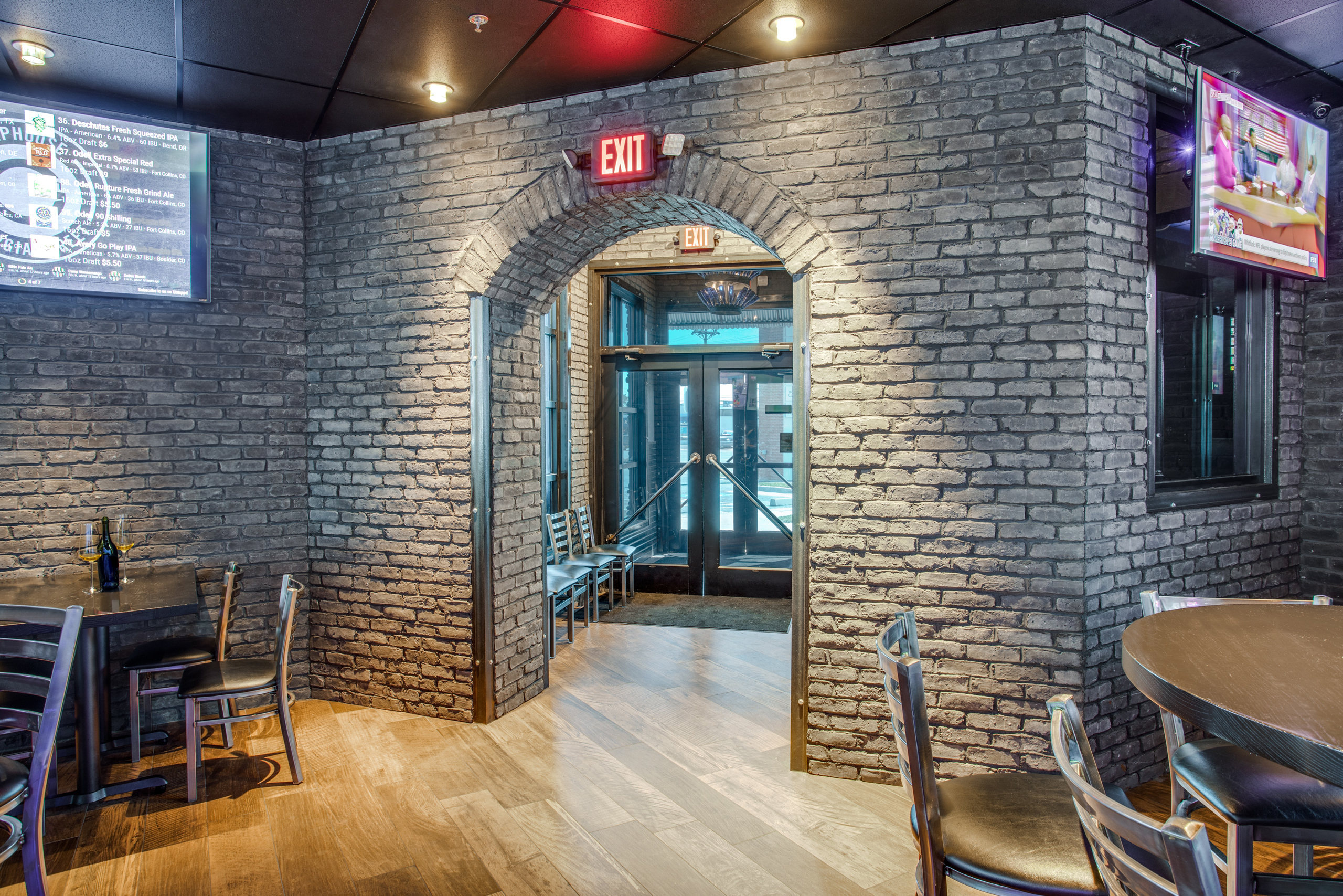 Charcoal brick veneer installation in modern bar and grill